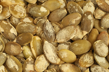 Food background - shelled  pumpkin seeds