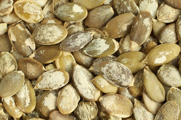 Food background - shelled  pumpkin seeds