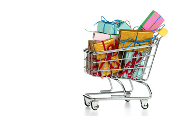 Shopping trolley / cart full of gift boxes isolated on white background with copy space