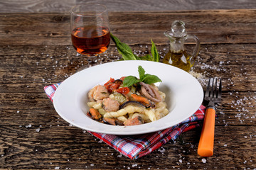 Plate with busiate and fish dressing 