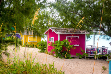 Small colorful house on the beach 