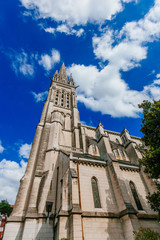 Fototapeta na wymiar Tower of the Church of Saint Martin in the city centre of Pau, France