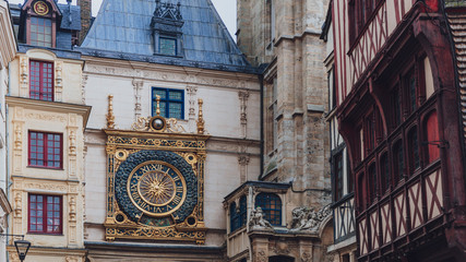 The Gros-Horloge (Great-Clock) on the Renaissance arch among building in downtown Rouen, France