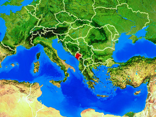 Montenegro from space on model of planet Earth with country borders and very detailed planet surface.