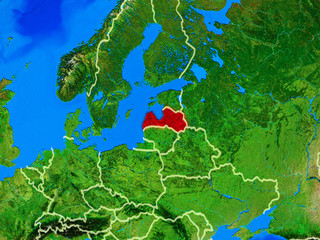 Latvia from space on model of planet Earth with country borders and very detailed planet surface.
