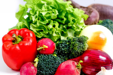 a fresh group of vegetables on white background