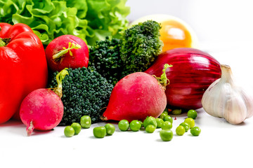 a fresh group of vegetables on white background