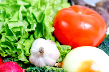a fresh group of vegetables on white background