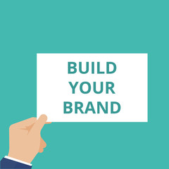 Writing note showing Build Your Brand.