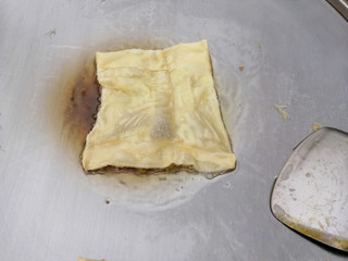 Making of Roti by knead the dough and fry in oil.