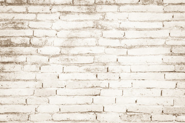 Cream colors and brown brick wall art concrete or stone texture background in wallpaper limestone abstract paint to flooring and homework/Brickwork or stonework clean grid uneven interior rock old.