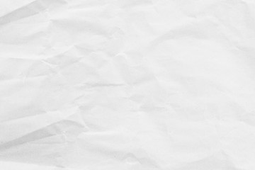 White background paper, crumpled texture and watercolor. Old vintage page with a glowing center and grunge vignette.