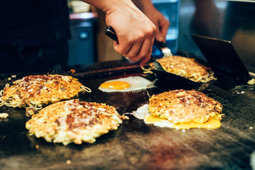 Chef making delicious food teppanyaki restaurant