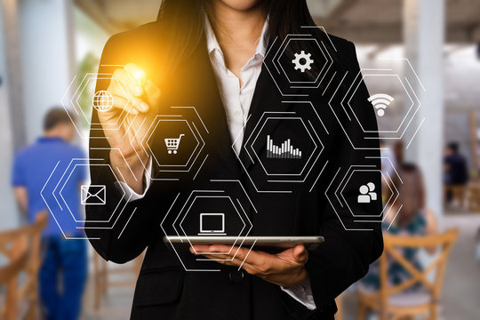 Digital marketing media  in virtual icon globe shape business open his hand, working touch screen tablet.