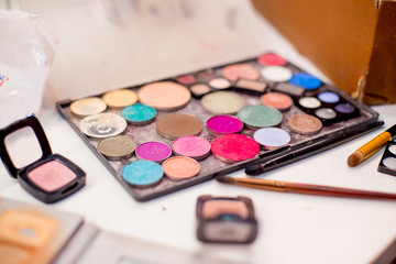 Fototapeta na wymiar set of things for makeup: brushes, mascara, eyeliner