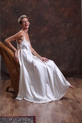 beautiful smiling bride in white dress