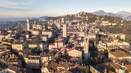 Fototapeta na wymiar Bergamo, Italy. Drone aerial view of the old town. Landscape at the city center and its historical buildings