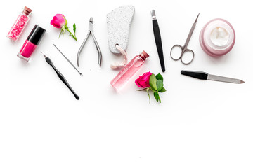 tools for manicure with spa salt and rose on white background top view mock up