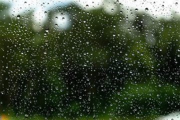 Rain drop on the glass a windows. as background
