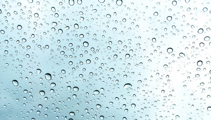 Fototapeta na wymiar Rain drop on the glass a windows. as background