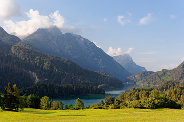 Obraz premium Domegio di Cadore, Italy Beautiful lake in the mountains at sunrise.