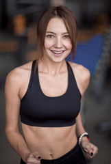 Fototapeta na wymiar close up.portrait of an attractive woman in the gym