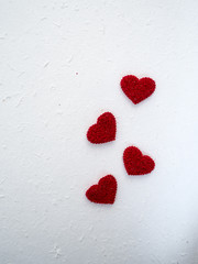 Heart shaped fabric on white mulberry paper