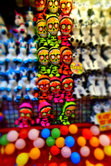 Fototapeta na wymiar Toys and balls in an arcade booth at the fair