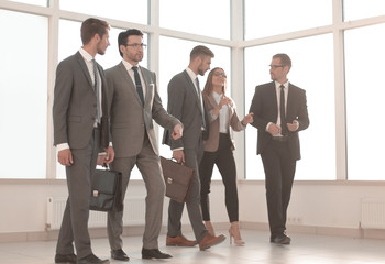 Fototapeta premium Businesspeople walking in the office background.