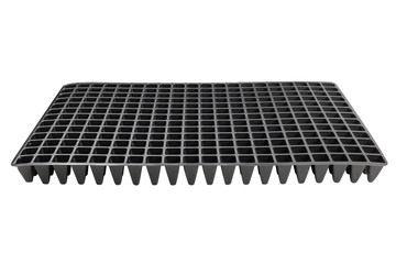 plastic tray with small cells for seedlings, on a white background