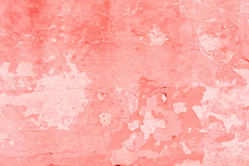 Texture, wall, concrete, living coral. It can be used as a background . Wall fragment with scratches and cracks
