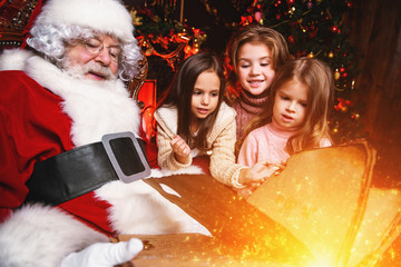 Fototapeta na wymiar reading book with santa