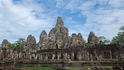 Fototapeta na wymiar Faces of Bayon temple in Angkor Thom, Siemreap, Cambodia. The Bayon Temple (Prasat Bayon ) is a richly decorated Khmer temple at Angkor , ancient architecture in Cambodia