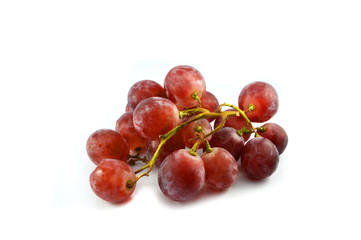Red grapes out of the refrigerator / Withered begin grapes isolated on white