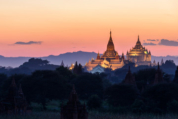 Fototapeta na wymiar Illumination of Giant Pagoda at Sunset, Bagan, Myanmar