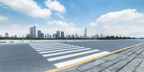 Panoramic skyline and modern business office buildings with empty road,empty concrete square floor
