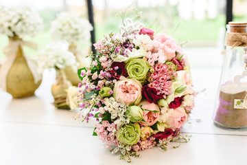 Happy bridal bouquet with pink and white tones for wedding day