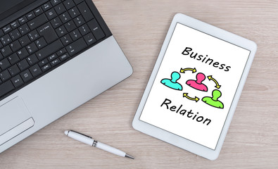 Business relation concept on a digital tablet