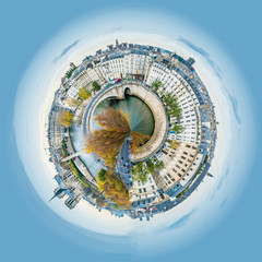 Little planet view of Panorama of Notre-dame-de-Paris and Seine river in Paris in autumn