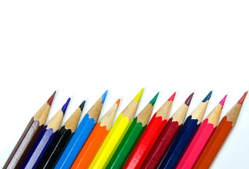 Fototapeta premium Multi colored pencils on white background