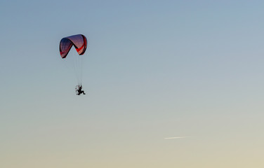 Paragliding on clear sky