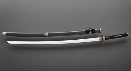 Japanese sword Katana  isolated on dark gray background 3d illustration