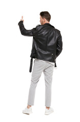 Back view of a man in a leather jacket showing thumb up