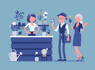 Flower shop lady sells, arranges cut flowers for customers