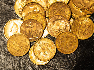 Close up gold money coin stacking on dark background