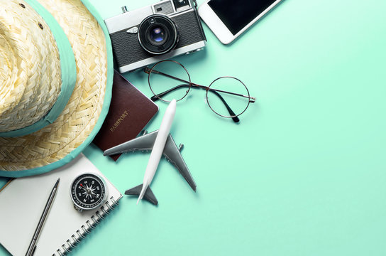 Travel Accessories Objects And Gadgets Top View Flatlay On Blue Pastel