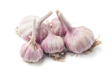 Heap of natural garlic isolated on white background