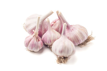 Heap of natural garlic isolated on white background