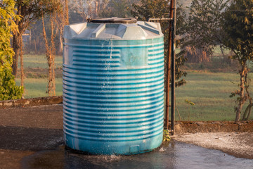 Water tank overflowing, fitted in house.