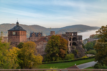 Fototapeta na wymiar Heidelberg at sunrise with fog over the river Neckar